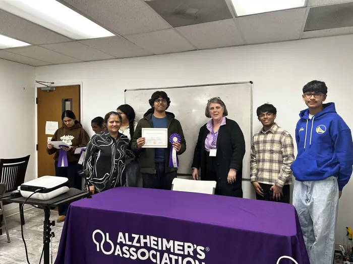 Certificate winners and organisers gathered at the Alzheimer's Association table.